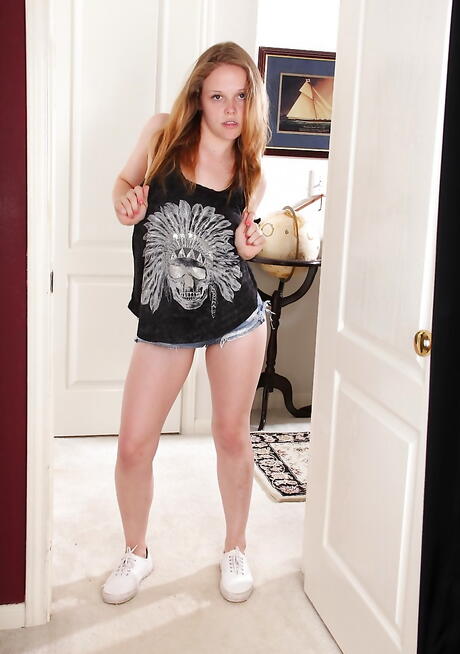 Gracile blonde youthful Sophia Monore unveiling small tits and spreading her legs 