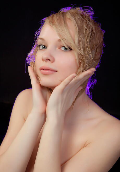 Sylphlike blonde teen Feeona A in fancy skirt exhibiting her butt and cute pussy outdoor