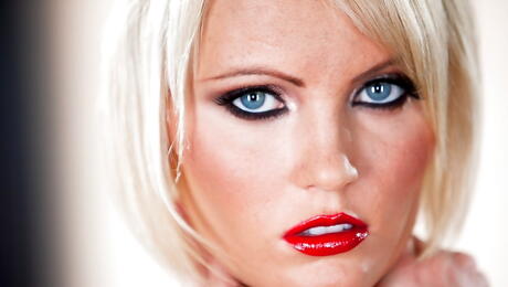 Attractive american blond milf Hanna Hilton exhibits big knockers and sexy ass 