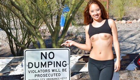 Svelte american red-haired teen Mila Jade exhibiting tiny tits and spreading her legs outdoor