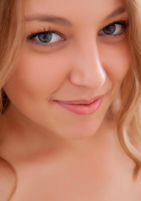 Sylphlike youthful Nikia A unveiling small tits and spreading her legs 