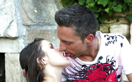 Slender hungarian brunette teen Anita Berlusconi in sexy shorts work on cock and takes a cum blast on her face outdoor