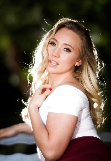 Sylphlike american blonde porn star Aj Applegate shows tiny tits and spreads her legs outdoor