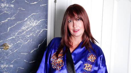 Very attractive mature Lily bares big boobies and jerks off in bath