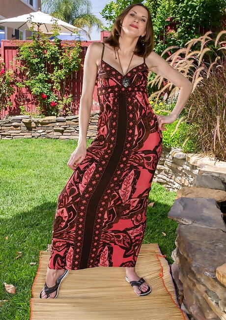 Excellent milf Valerie Voxx reveals big knockers and jerks off outdoor