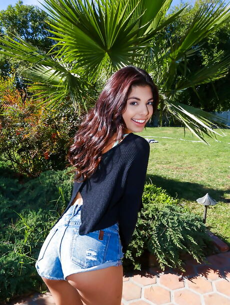 Stunning brazilian brunette cutie Gina Valentina denudes tiny tits and ass outside