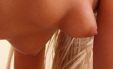 Hot blonde milf Kelly White exposes her ass in sexy skirt and spreading her legs 