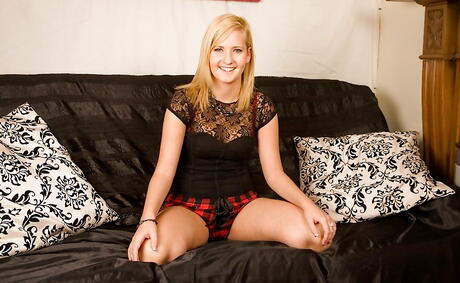 Sexy teen Charlie Baxter exhibits her ass in fancy shorts and spreads her legs 