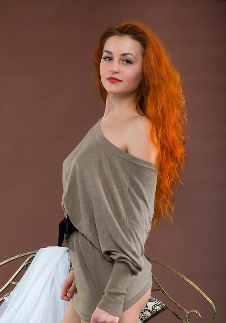 Gracile red-haired teen Sascha A showing big hooters and hairy pussy 