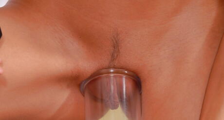 Wet And Puffy: Stunning babe Zoe exhibiting big tits and playing with toy