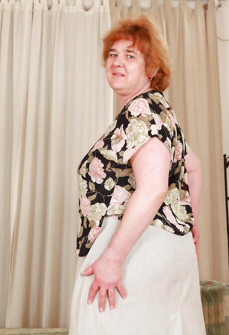 Hot granny Andrea Blue in stockings reveals big boobs and masturbates 