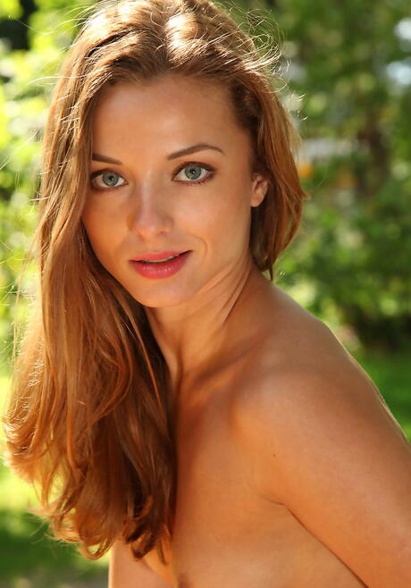 Sylphlike youthful Alyssa A in skirt shows her ass outside