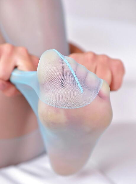 Curious babe Deborah in sexy pantyhose in nasty foot fetish action