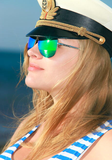 Slender teen Alessandra A baring big hooters and butt on the beach