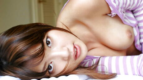 Very attractive japanese Erika Satoh uncovers tiny tits and sexy ass 