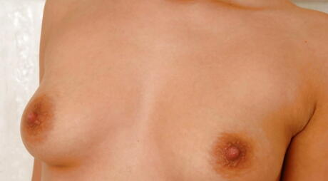 Euro Teen Erotica: Sexy blonde teen Regina baring big boobies and hairy beaver in shower