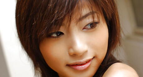 Charming japanese babe Rin Suzuka baring big tits and hot ass 