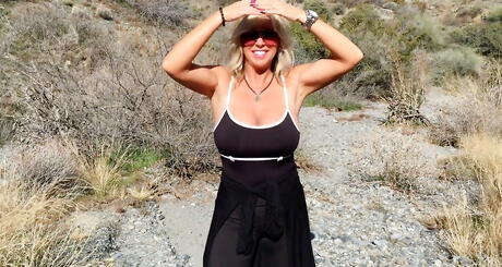 Lovely american blond housewife Sandra Otterson in glasses posing