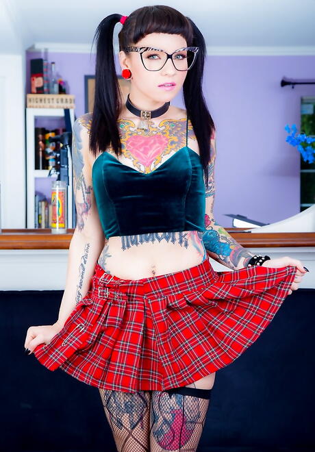 Svelte american brunette Necro Nicki in nice skirt unveiling tiny tits and spreading her legs