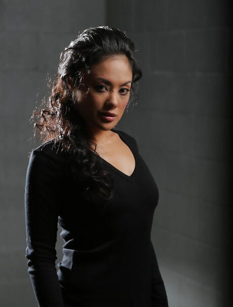 Luscious malaysian milf Kaylani Lei uncovers tiny tits while taking off her clothes 