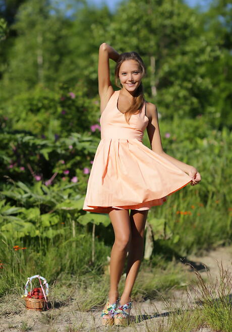 Excellent teen Katya Clover in fancy skirt unveils small tits and bald pussy outdoor