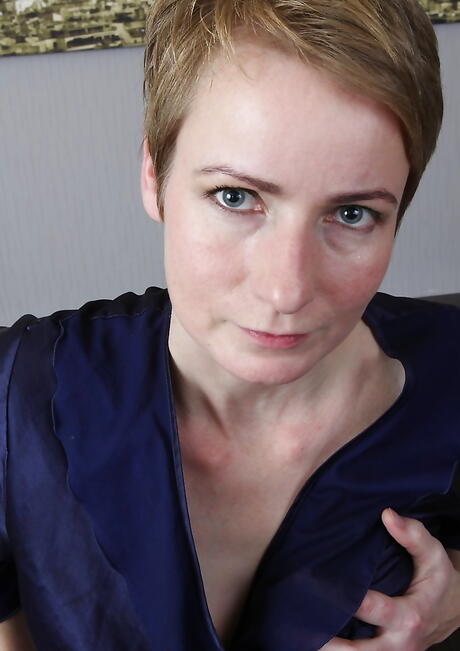 Curious czech blonde mature Sweet Nensy denudes big boobies and hairy beaver 