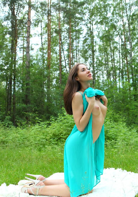 Excellent russian young Aruna Aghora in skirt exposes her butt and masturbates outdoor