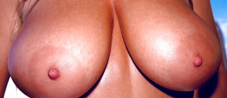 Busty Ines Cudna: Delightful polishie milf Ines Cudna in jeans exhibiting big boobs and spreading her legs outdoor