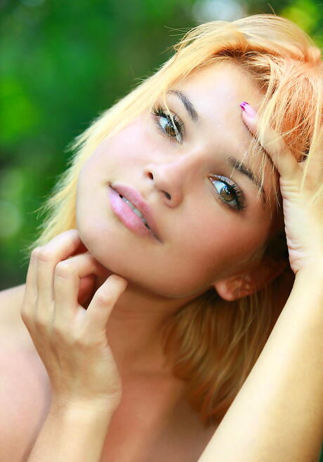 Excellent ukrainian blond youthful Violla A showing big titties and shaved pussy outside