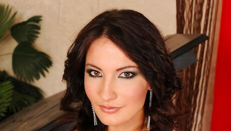 Shapely dark hair youthful Bailee in nice skirt reveals her butt and spreads her legs 