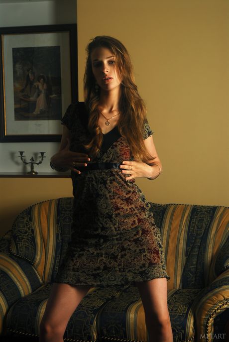 Svelte teen Vika AC highlights her tiny tits and hairy pussy