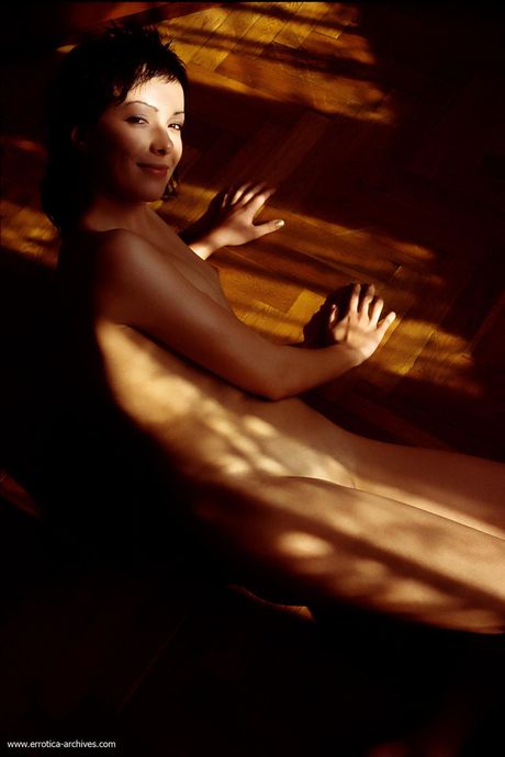 Brunette chick Marcela shows off her naked body with grace