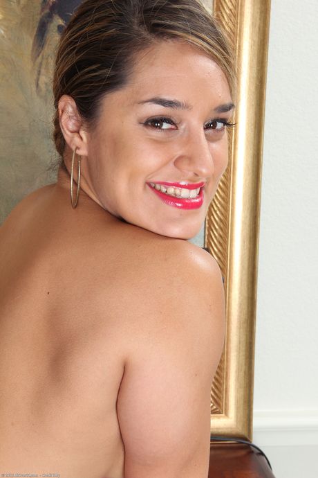 Hot secretary Alexa Thomas strips to stockings and presents her big tits