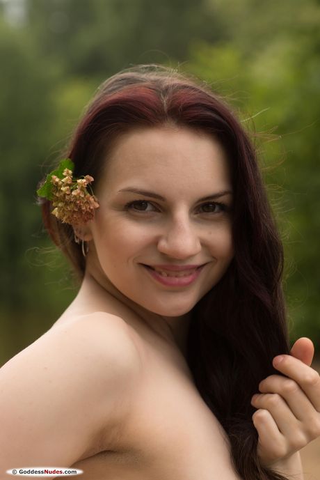 Russian beauty Lisa Musa flaunting her big ass and tits outdoors