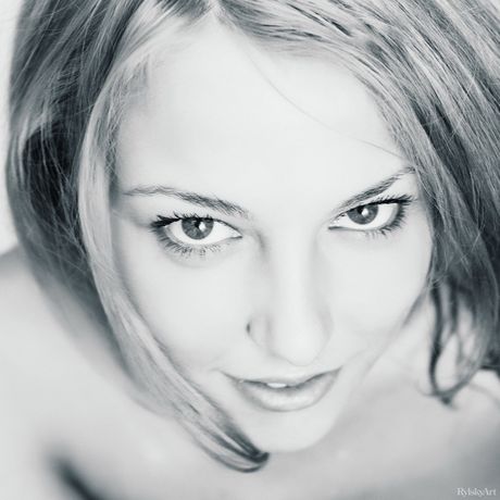 Nice teen Nikia bares her body on a blanket in a field of wildflowers