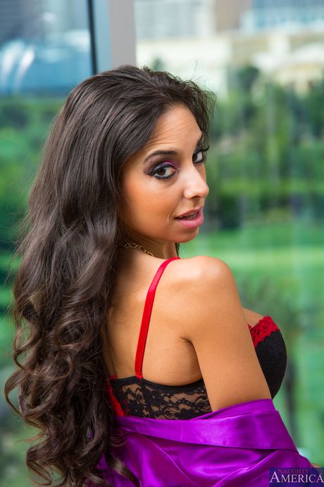 Skinny brunette Trinity St. Clair strips to her stockings & shows her ass