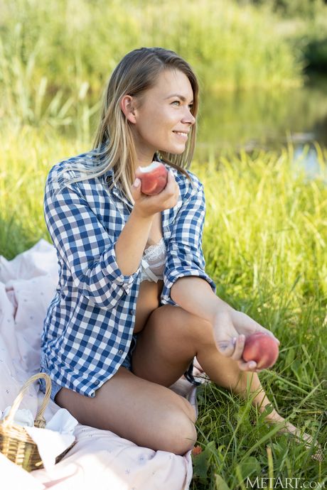 Skinny blonde Paulina gets naked on a blanket in a field of wheat