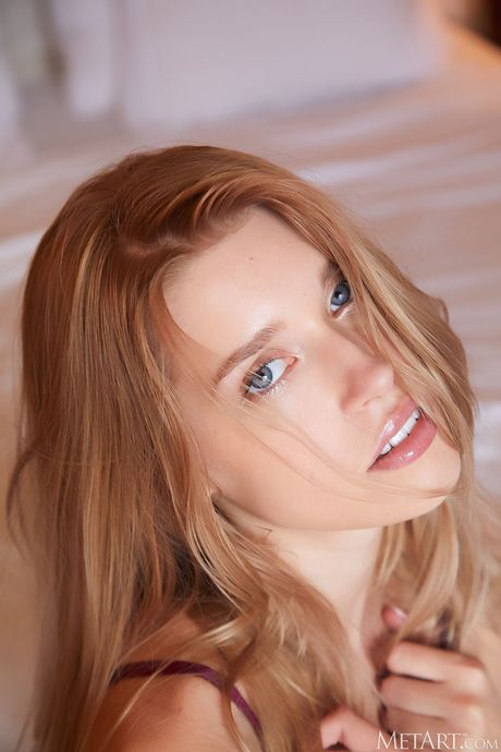 Sexy blonde teen Freya Mayer removes her lingerie to pose nude