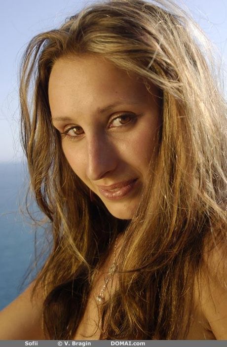 Skinny teen Sofii posing naked outdoors to show her tiny tits & bald pussy