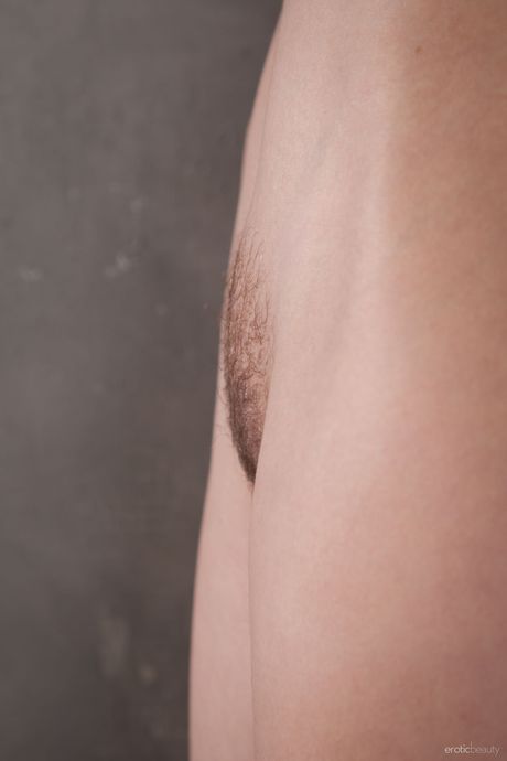 Svelte teen Ulia models totally naked confidently