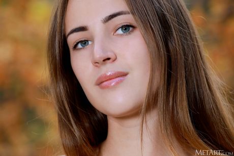 Russian belle Hailey goes nude in a forest while alone