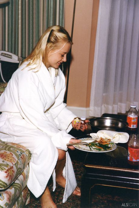 Blonde teen Jana Irrova shows her tiny tits and bald pussy in the bathroom