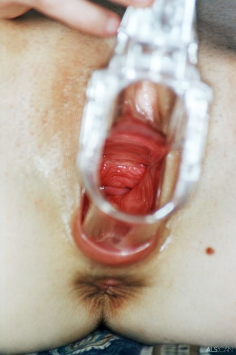 Winsome teenage brunette with tiny tits stripping and teasing her pussy