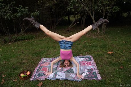 Skinny blonde teen Addee Kate gets naked before toying her pussy