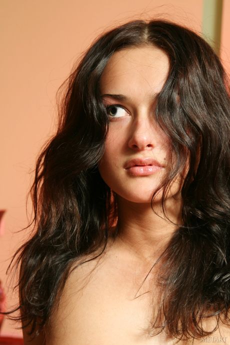 Beautiful teen Beatrice B models naked in high heels and a tiara