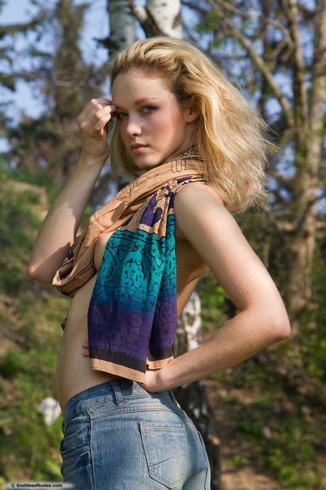 Slender teen Alisa G poses nude and reveals her tiny tits and hot pussy