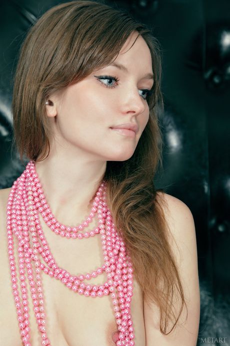 Brunette teen Patrizia A removes her dress to model in the nude