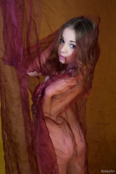 Beautiful young girl Jeff Milton poses completely naked in a solo