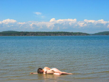 Sexy teen babes with small tits posing naked on the beach