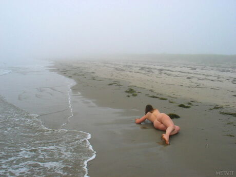 Sexy teen babes with small tits posing naked on the beach